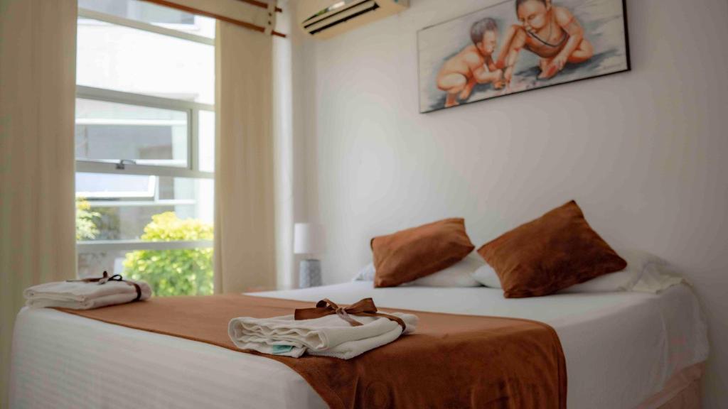 Postel nebo postele na pokoji v ubytování Zuruma Hotel