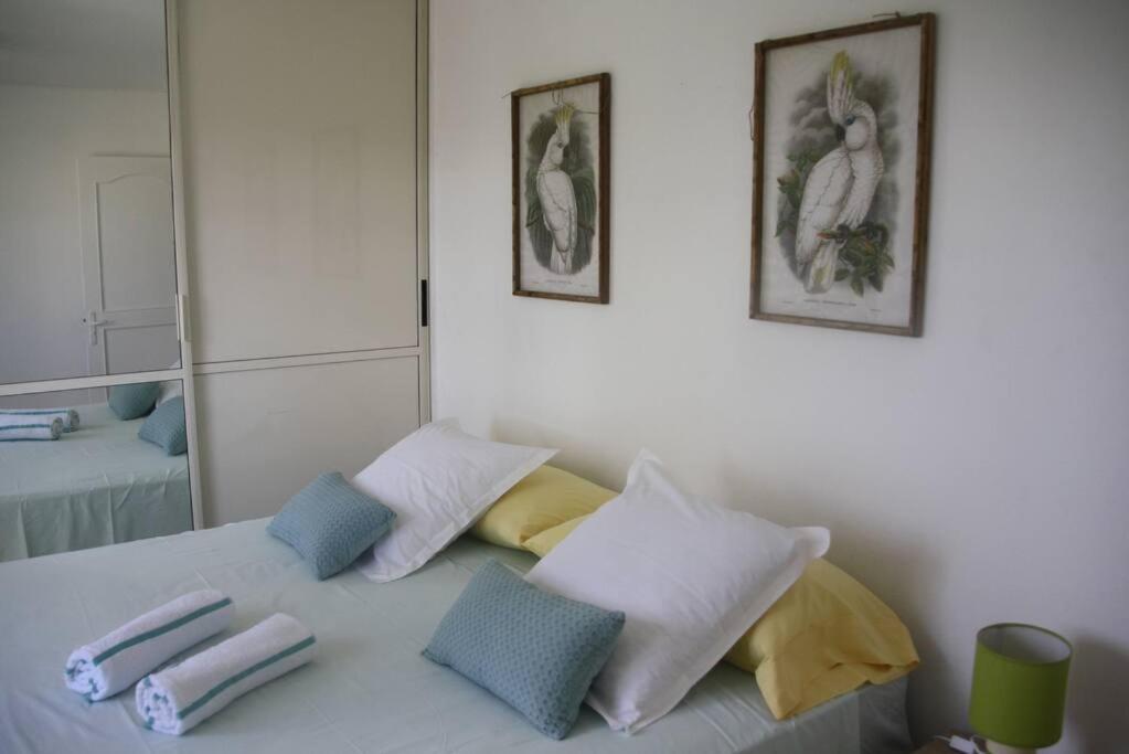 Postel nebo postele na pokoji v ubytování Apt 2 chambres Vue Lagon
