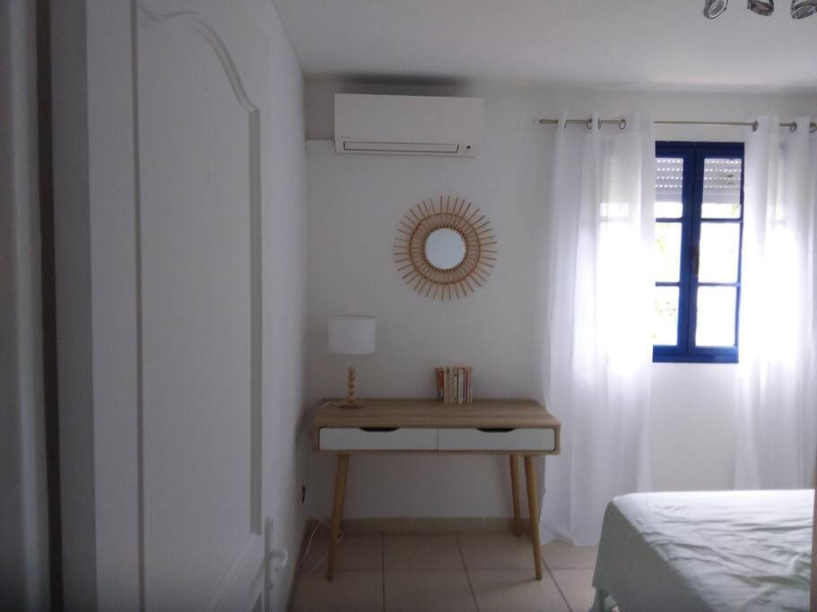 Postel nebo postele na pokoji v ubytování Apt 2 chambres Vue Lagon