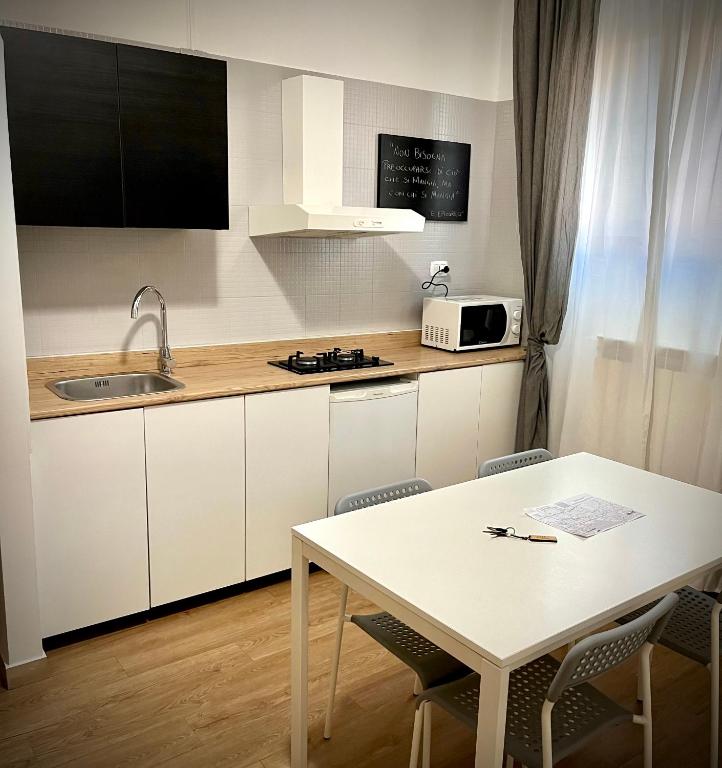 Kuchyň nebo kuchyňský kout v ubytování Il Sole