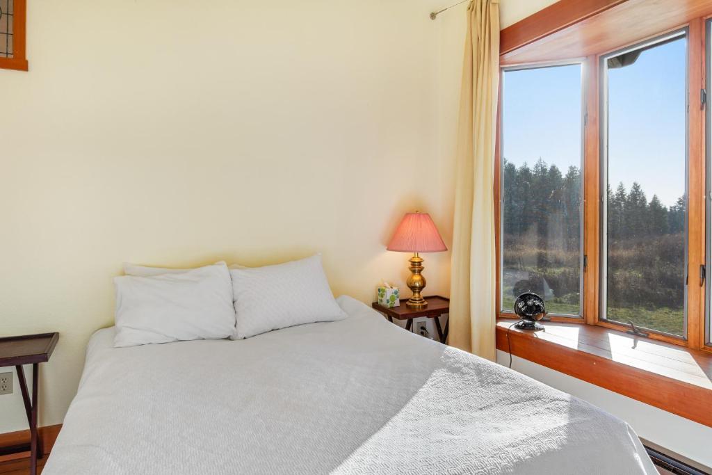 Postel nebo postele na pokoji v ubytování Milagra Guest House