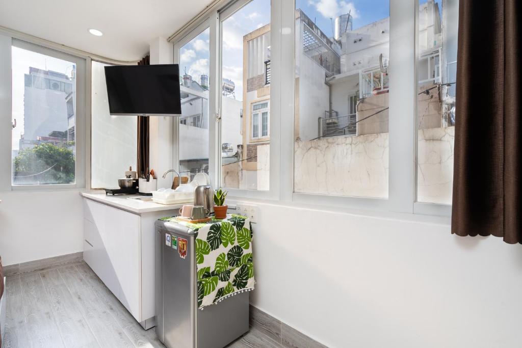 Nhà bếp/bếp nhỏ tại Ekomo Home - Central Saigon