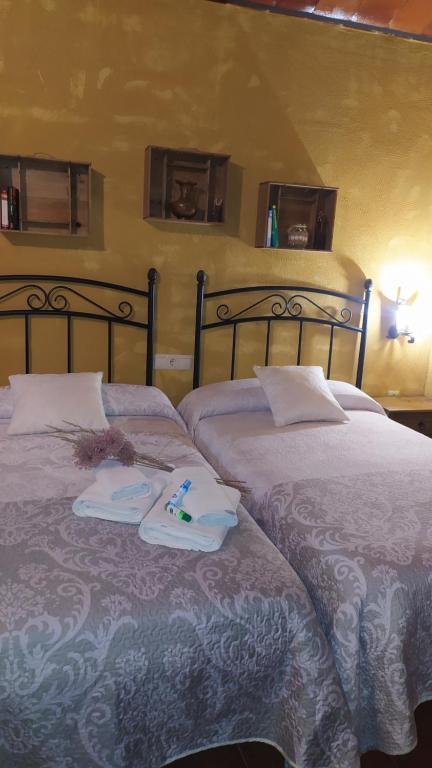Postel nebo postele na pokoji v ubytování Cortijo Molino los Justos