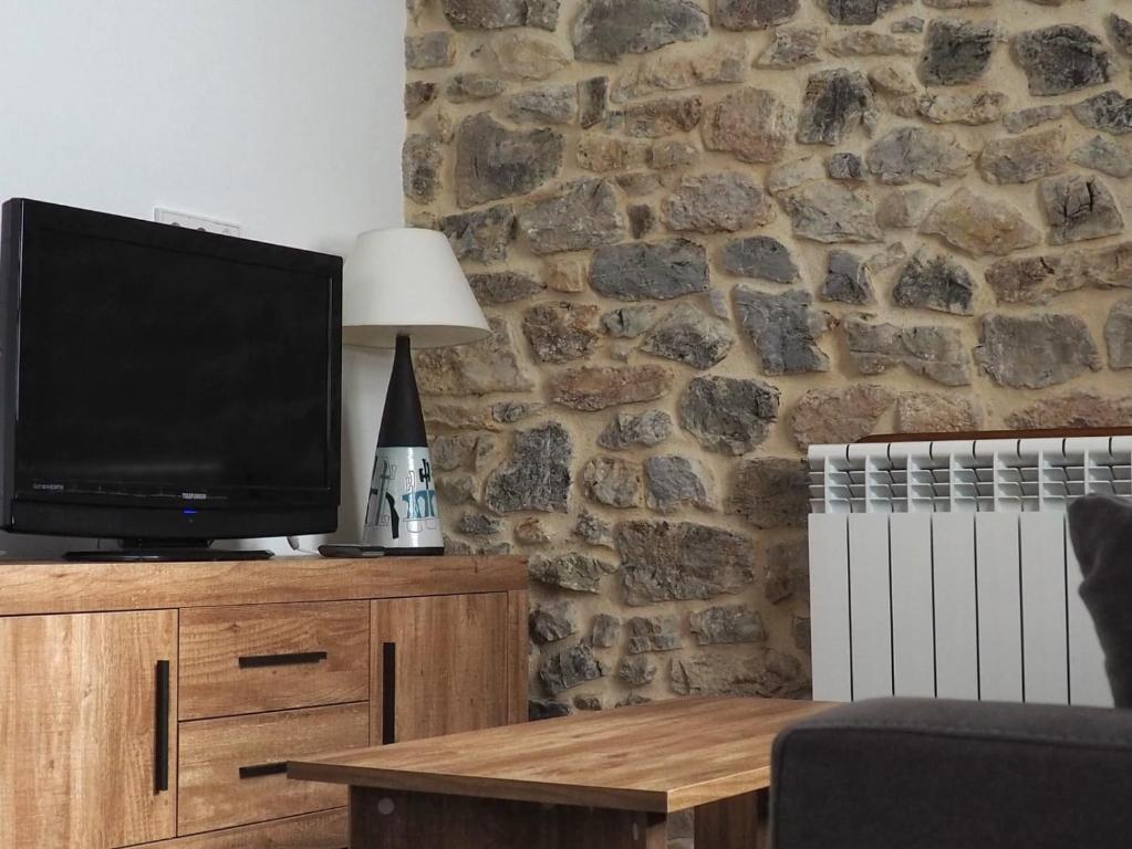 Televízia a/alebo spoločenská miestnosť v ubytovaní El APARTAMENTUCO