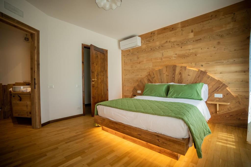 Postel nebo postele na pokoji v ubytování GATTO IN VIGNA