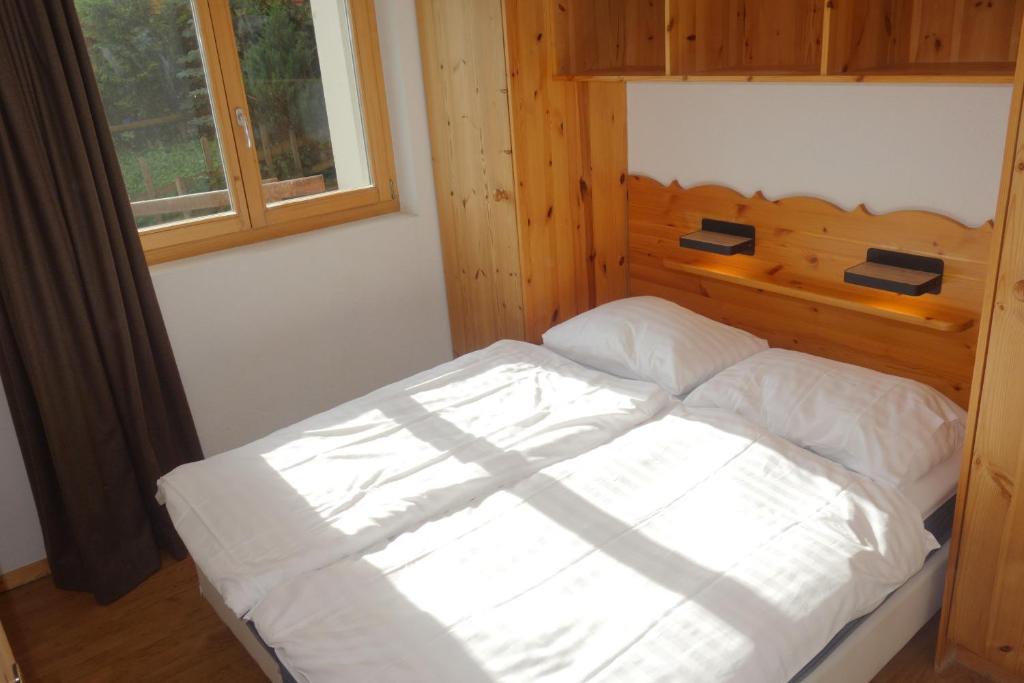 Postel nebo postele na pokoji v ubytování Pracondu 1 001 - OUTDOOR & FUN apartment 8 pers