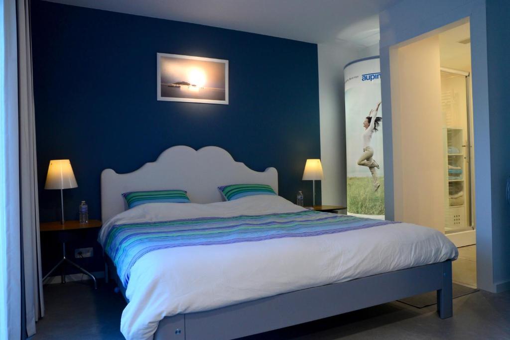 Ένα ή περισσότερα κρεβάτια σε δωμάτιο στο Bleus Nuit