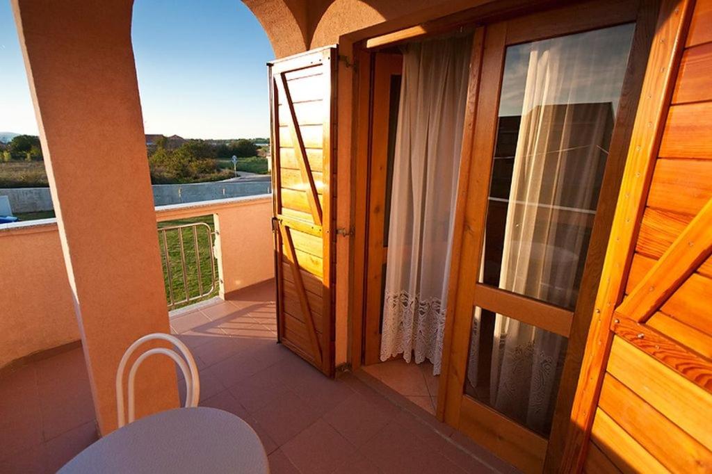 Balkón nebo terasa v ubytování Apartment in Privlaka with sea view, balcony, air conditioning, WiFi 3598-2