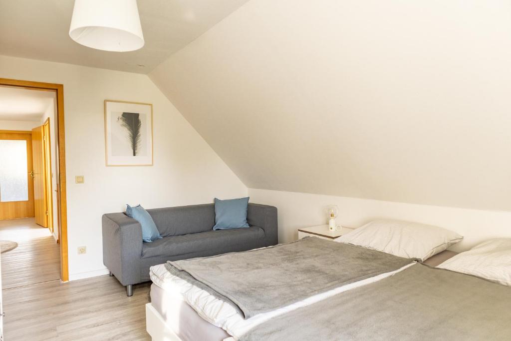 Postel nebo postele na pokoji v ubytování Ferienhaus Tidenkieker