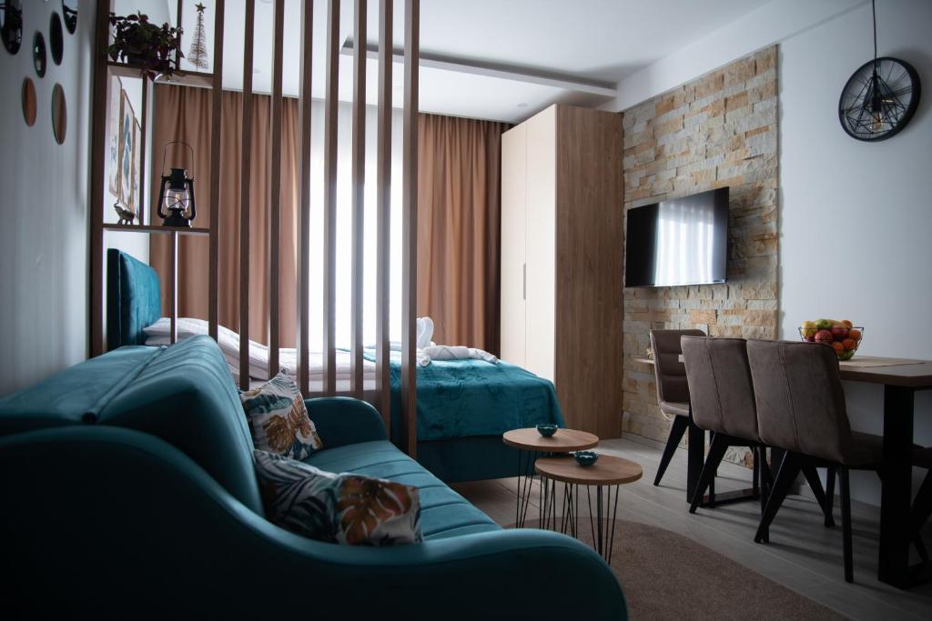 TV a/nebo společenská místnost v ubytování Apartman Larisa