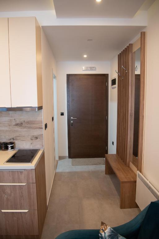 Kuchyň nebo kuchyňský kout v ubytování Apartman Larisa