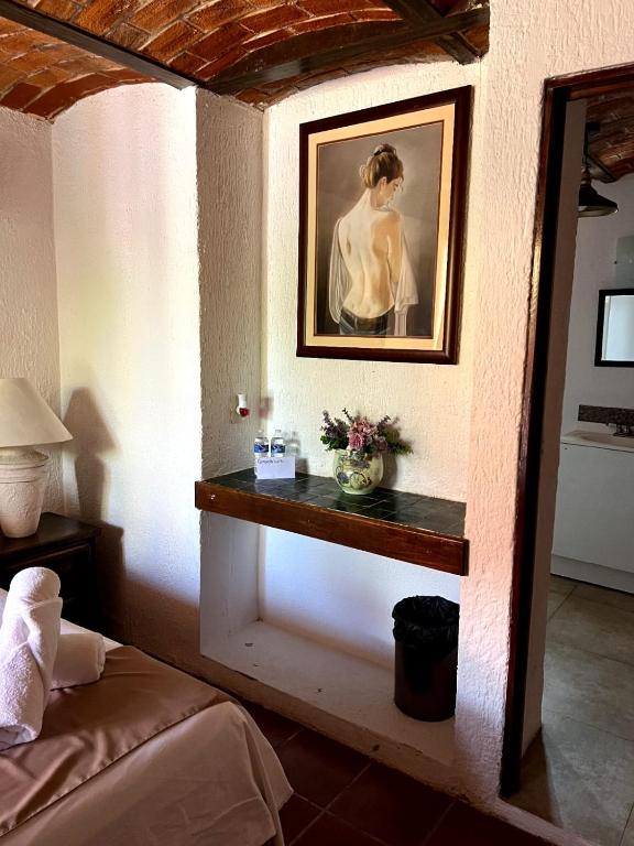 Postel nebo postele na pokoji v ubytování Hotel Villas Ajijic, Ajijic Chapala Jalisco