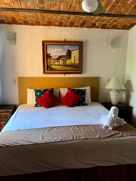 Postel nebo postele na pokoji v ubytování Hotel Villas Ajijic, Ajijic Chapala Jalisco