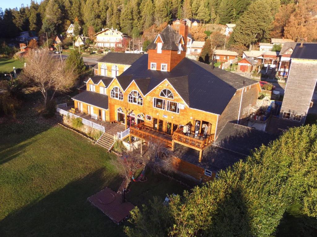 an aerial view of a large home with a large house at Hosteria La Luna in San Carlos de Bariloche