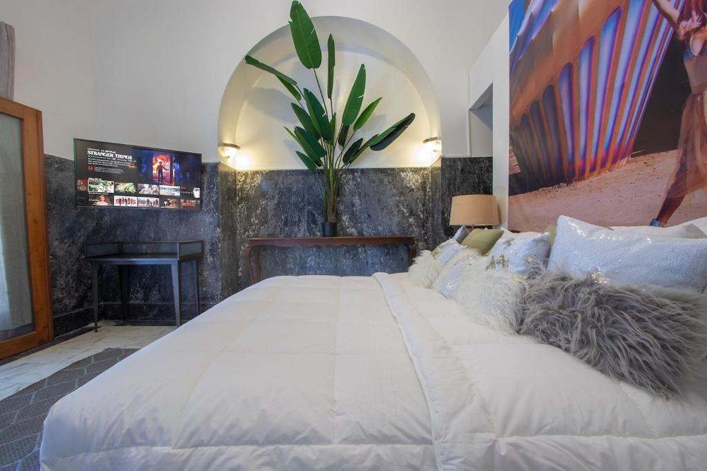 Postel nebo postele na pokoji v ubytování AmazINN Places Casco Viejo Pool and Rooftop VII