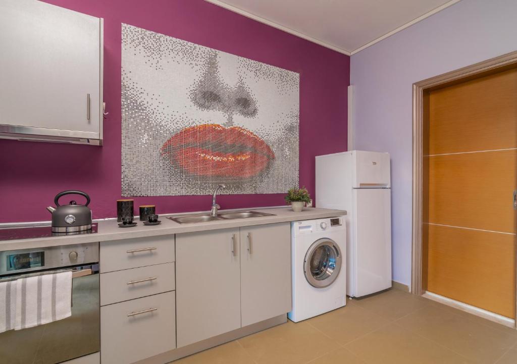 Kuchyň nebo kuchyňský kout v ubytování Nostalgia Apartments Zante