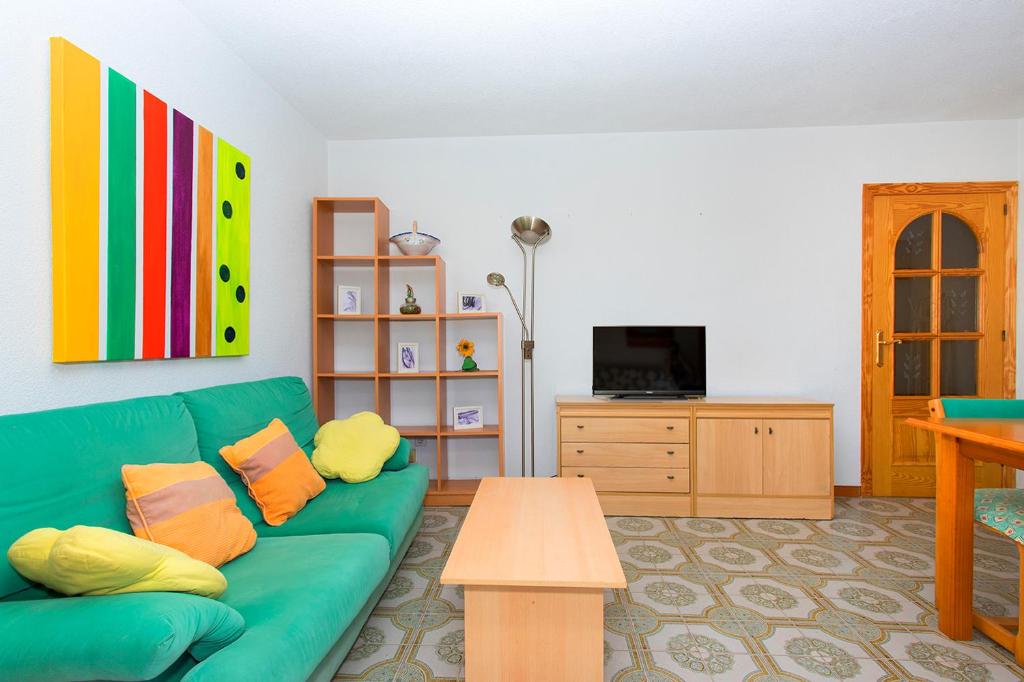 TV a/nebo společenská místnost v ubytování Sensacional piso junto al mar