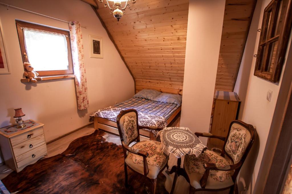 Posteľ alebo postele v izbe v ubytovaní LESZCZYNOWY STOK
