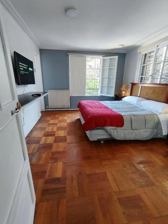 Postel nebo postele na pokoji v ubytování HOSTAL SUZI