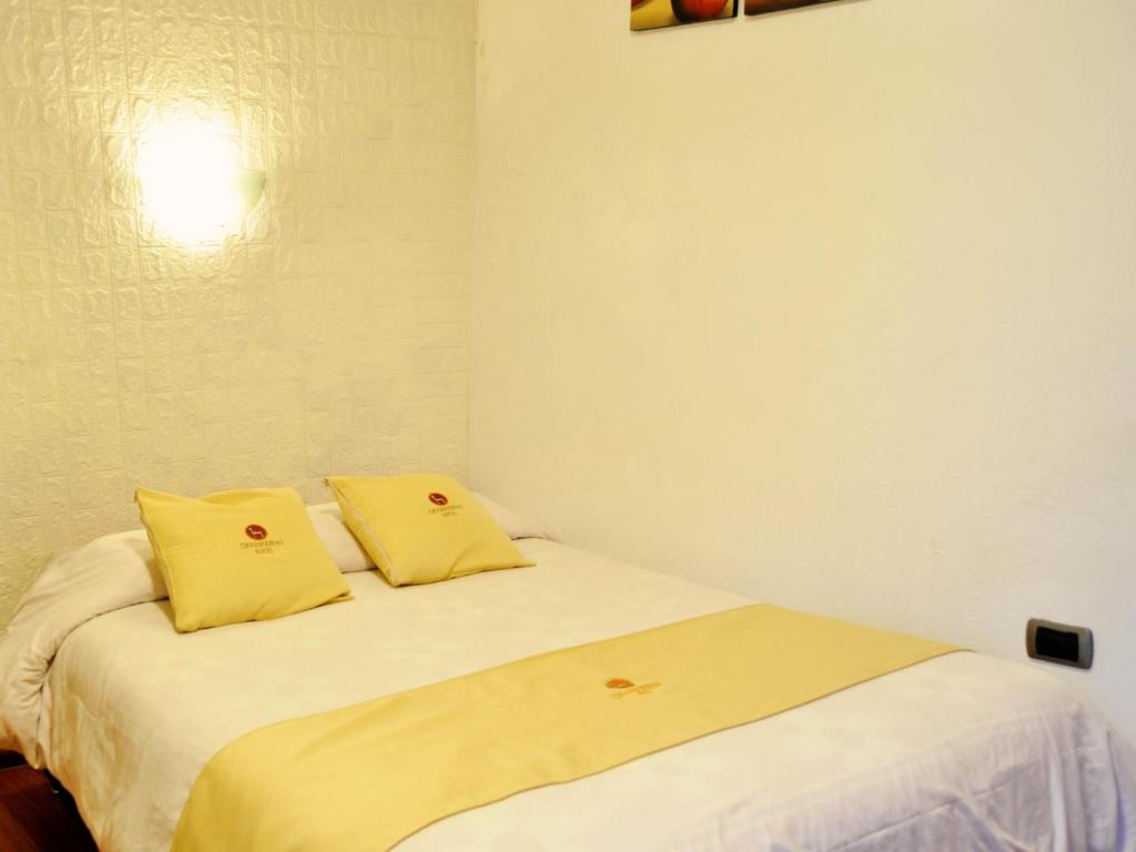 Postel nebo postele na pokoji v ubytování Hotel Choquequirao