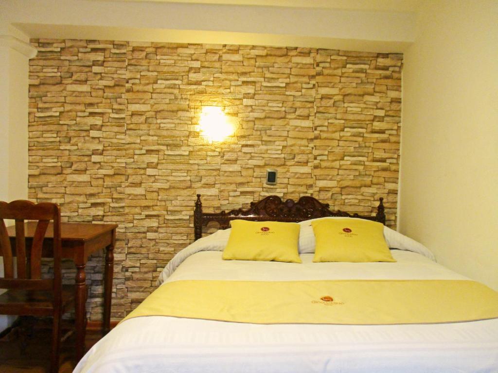 Postel nebo postele na pokoji v ubytování Hotel Choquequirao