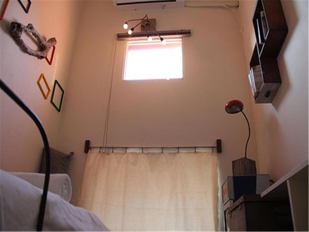 TV a/nebo společenská místnost v ubytování Kenting Sun Light Inn