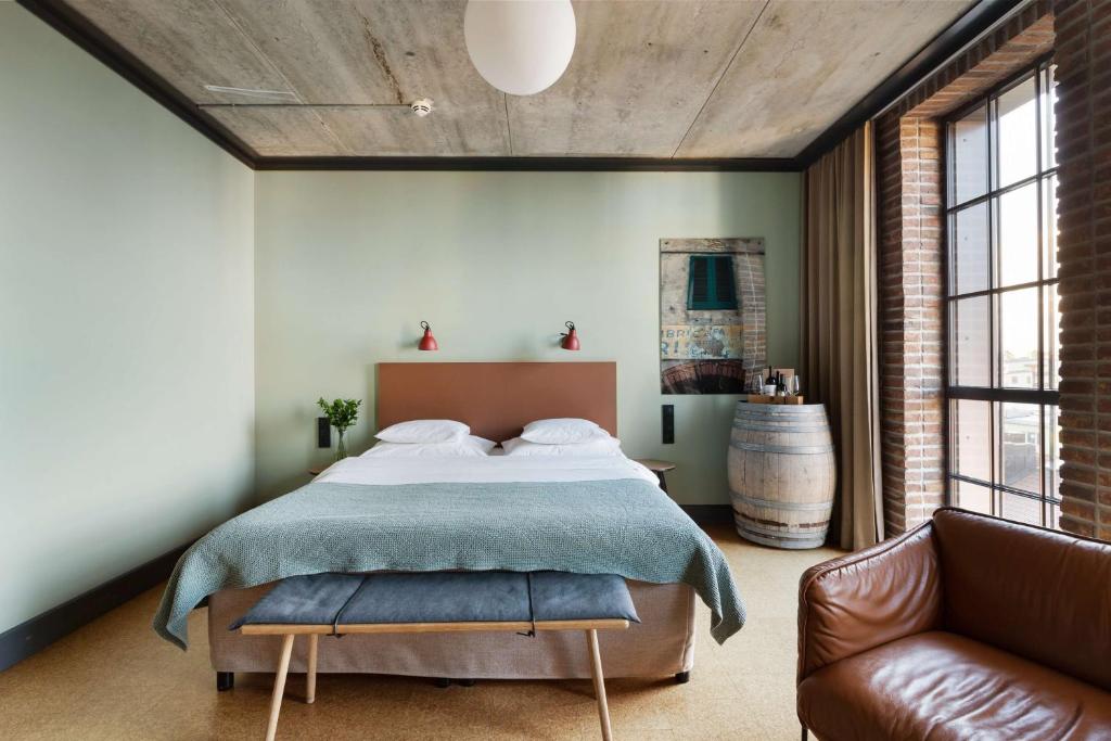 Postel nebo postele na pokoji v ubytování The Winery Hotel, WorldHotels Crafted