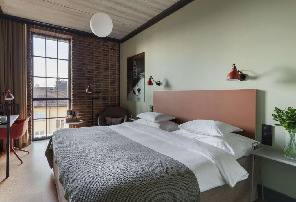 Postel nebo postele na pokoji v ubytování The Winery Hotel, WorldHotels Crafted
