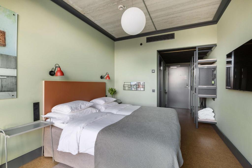 Postel nebo postele na pokoji v ubytování The Winery Hotel, WorldHotels Crafted