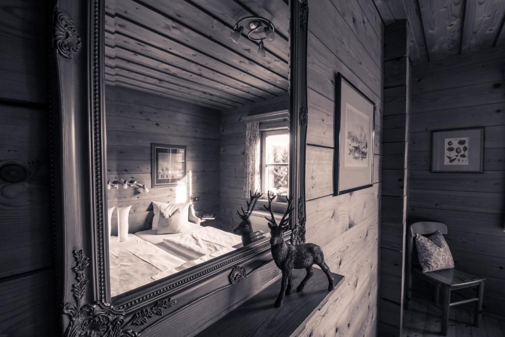 Posteľ alebo postele v izbe v ubytovaní Chalets Ebner