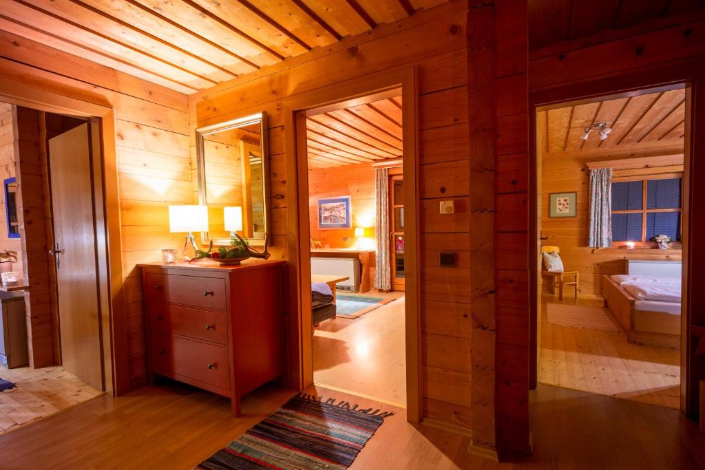 Posteľ alebo postele v izbe v ubytovaní Chalets Ebner
