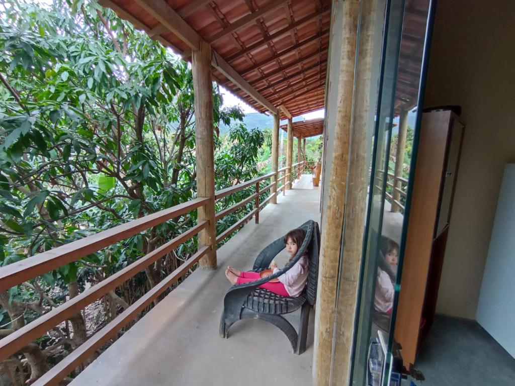 En balkong eller terrass på Residencial e Chalés Cristal