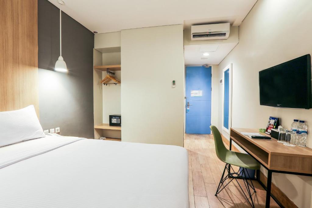TV a/nebo společenská místnost v ubytování Hotel Citradream Semarang