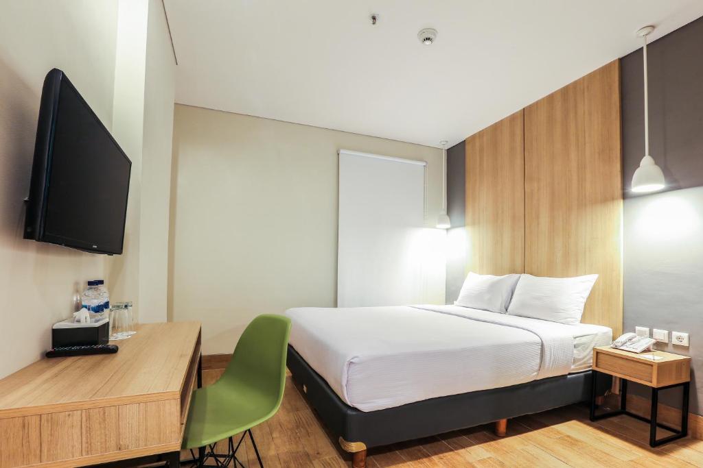 TV a/nebo společenská místnost v ubytování Hotel Citradream Semarang