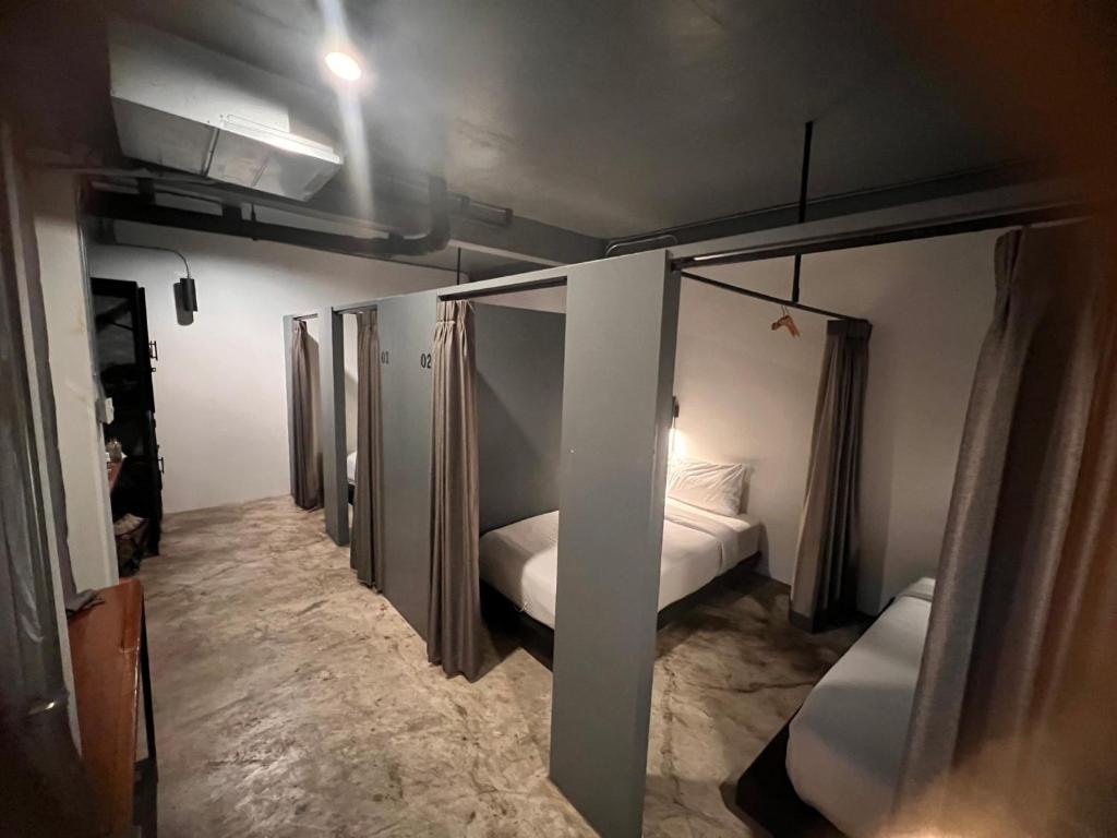 
Single Bed in Male Dormitory Room
