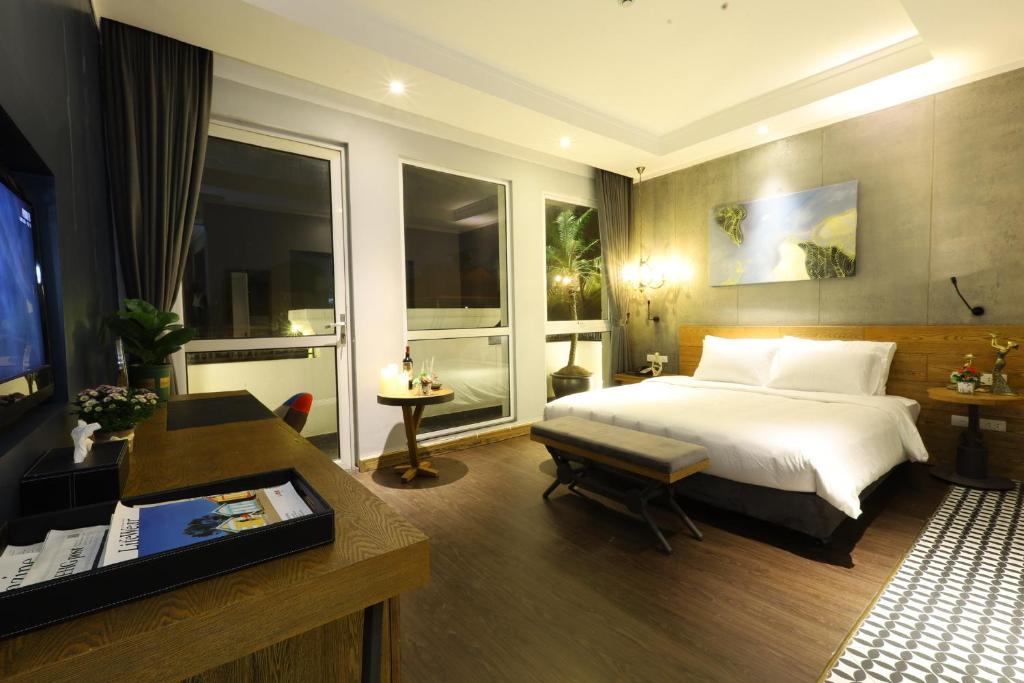 TV a/nebo společenská místnost v ubytování HaNoi Calido Hotel