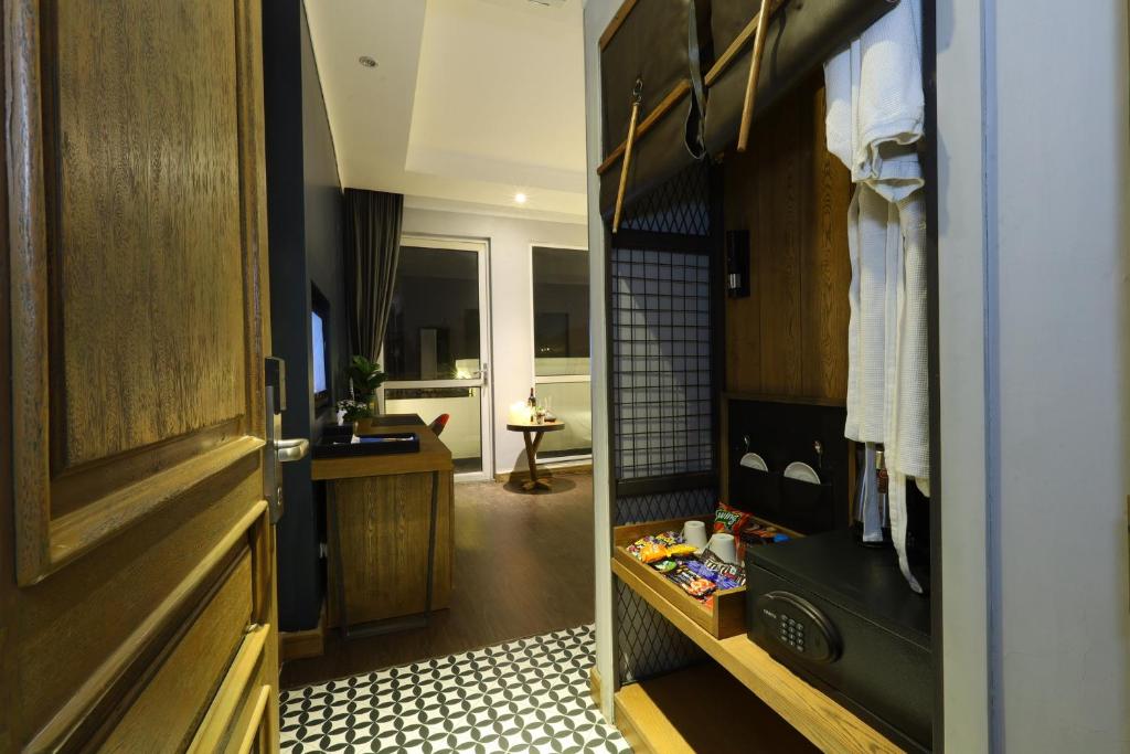 Kuchyň nebo kuchyňský kout v ubytování HaNoi Calido Hotel