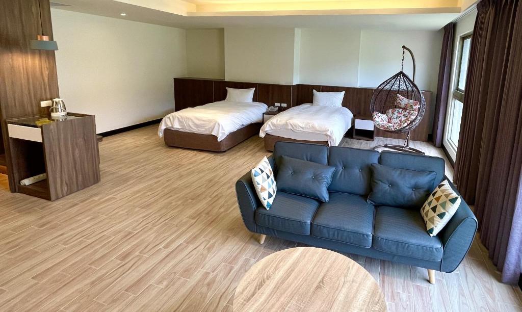 Postel nebo postele na pokoji v ubytování Long Fu Hotel
