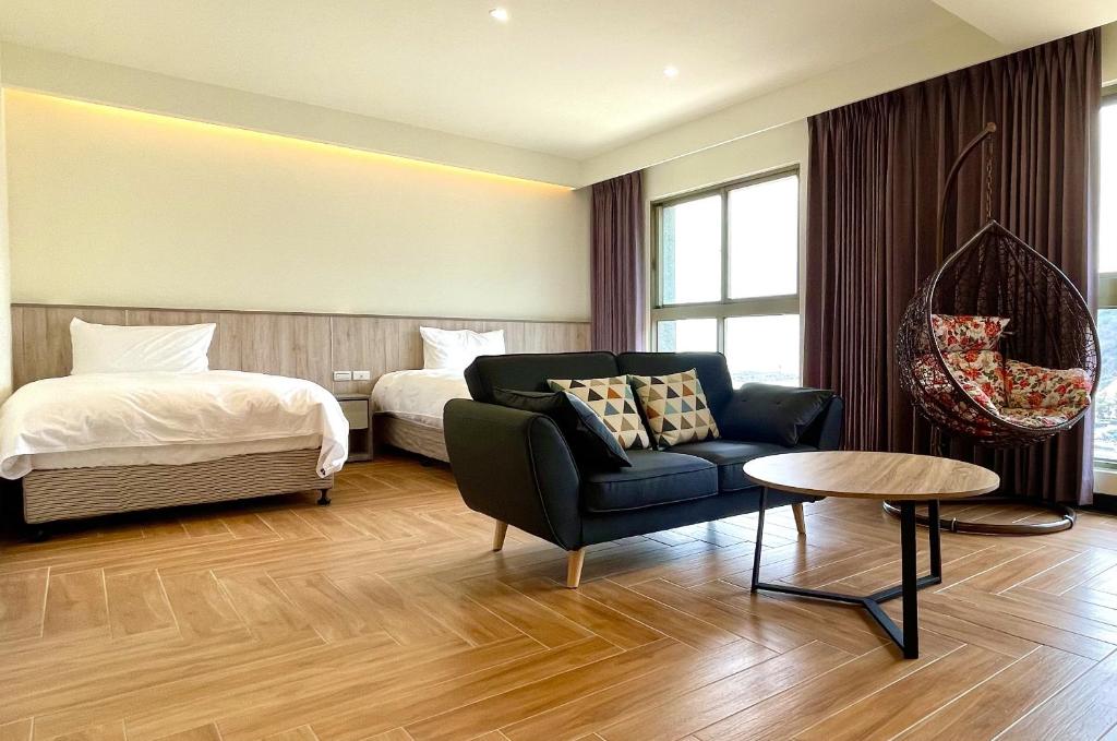 Postel nebo postele na pokoji v ubytování Long Fu Hotel