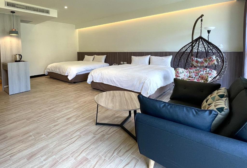 Postel nebo postele na pokoji v ubytování Long Fu Hotel