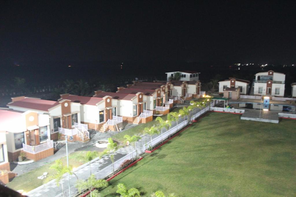 an aerial view of a row of houses at night at Flamingo Club and Resort Una 3 Km Away from Diu Check Post in Diu