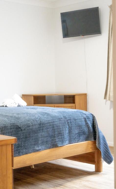 Postel nebo postele na pokoji v ubytování Sylvan Beach Resort