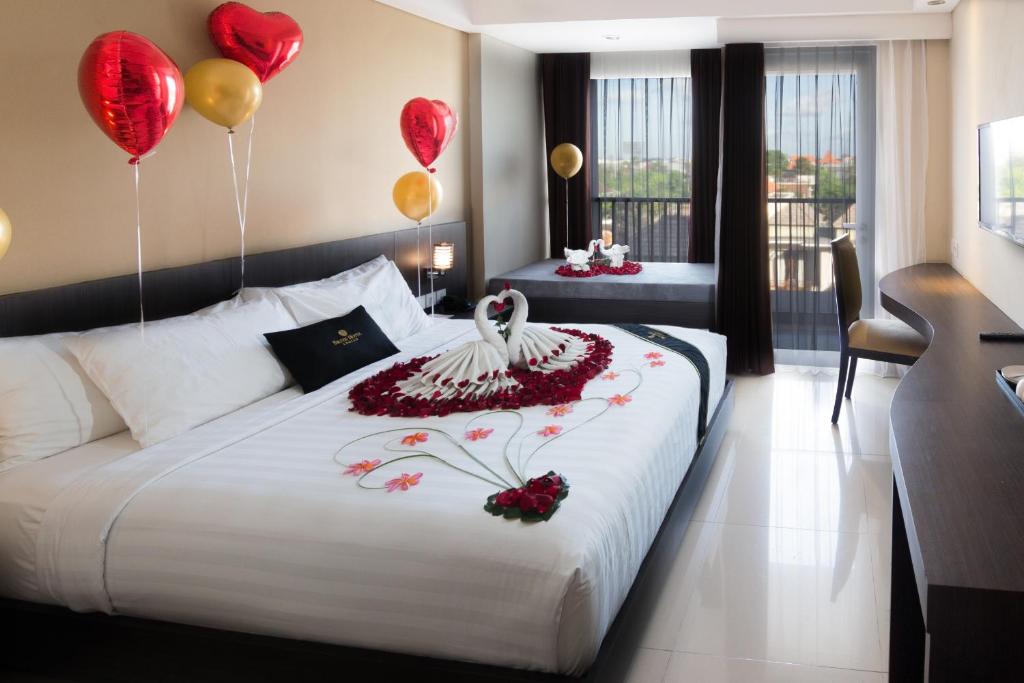 Postel nebo postele na pokoji v ubytování Brits Hotel Legian