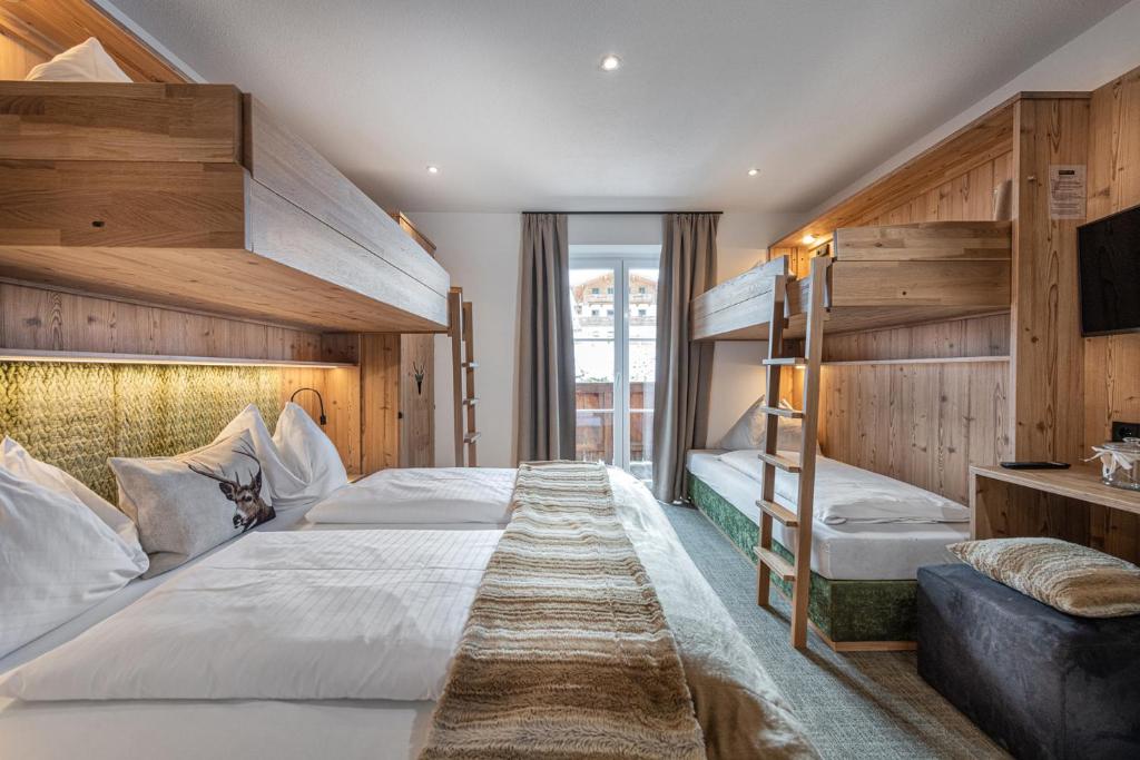 Postel nebo postele na pokoji v ubytování Jugendhotel Gruber