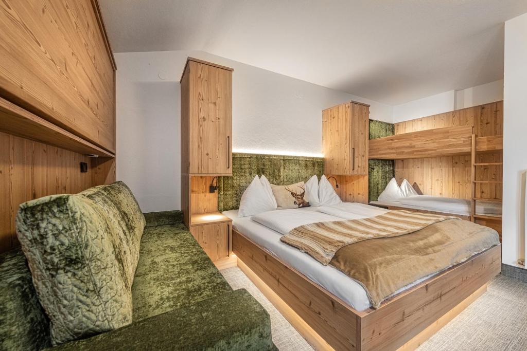 Postel nebo postele na pokoji v ubytování Jugendhotel Gruber