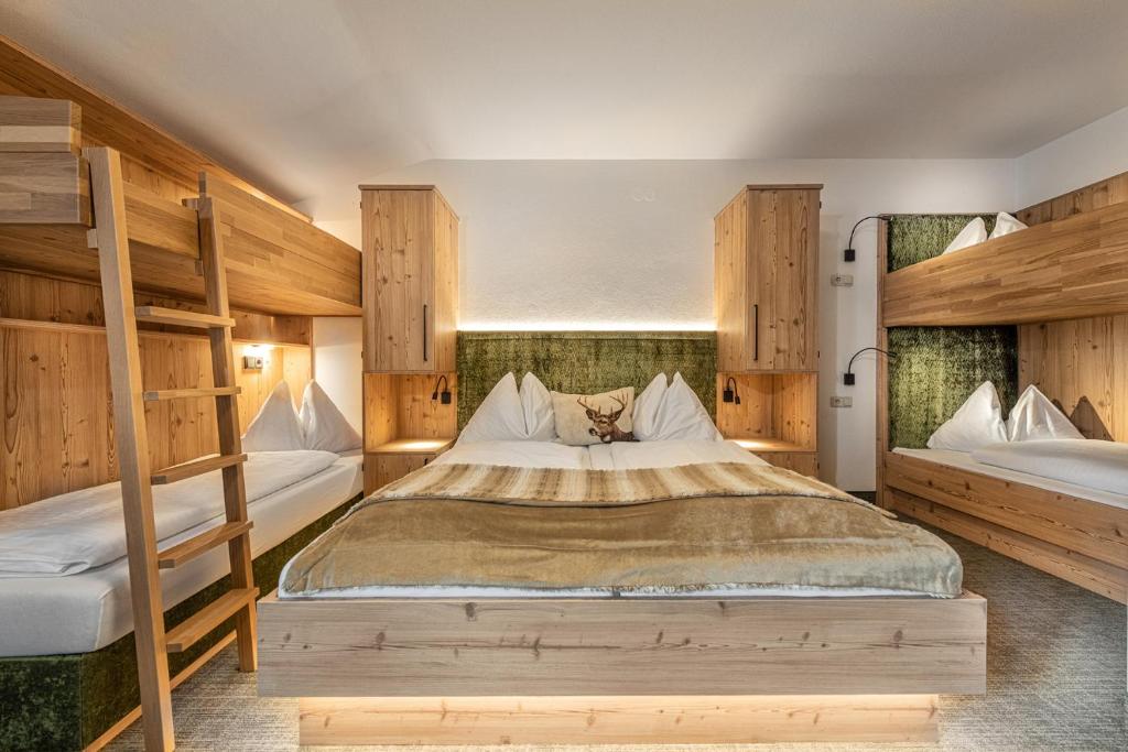 Postel nebo postele na pokoji v ubytování Jugendhotel Gruber