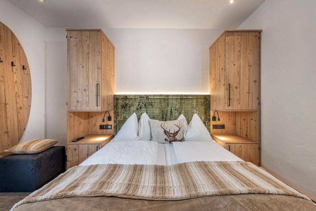 Postel nebo postele na pokoji v ubytování Jugendhotel Gruber