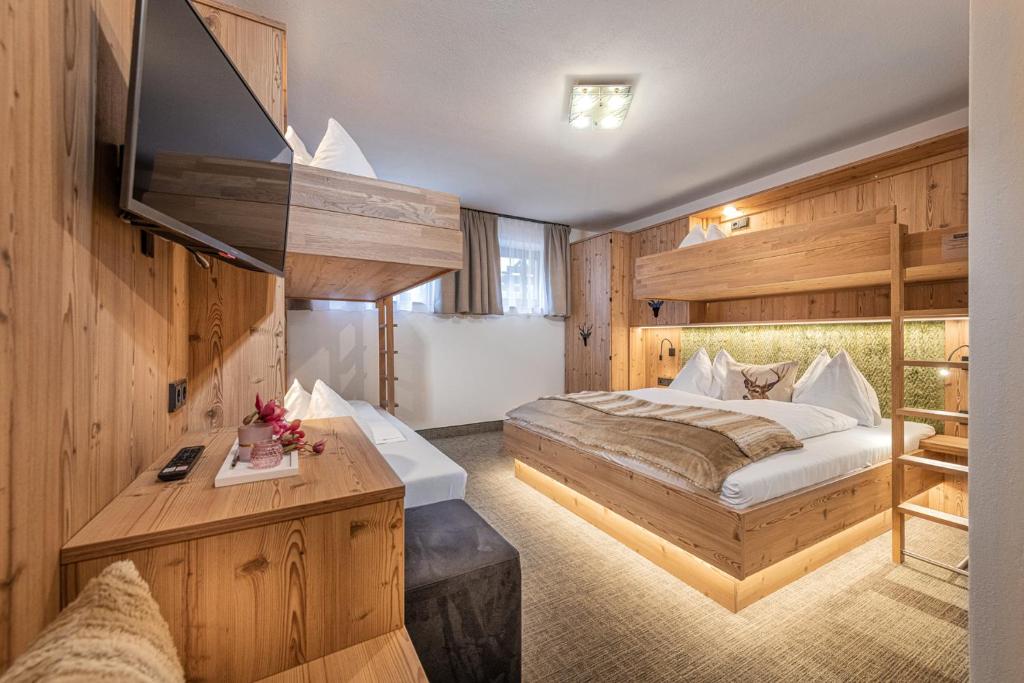 Postel nebo postele na pokoji v ubytování Jugendhotel Gruber