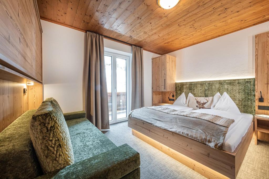 Postel nebo postele na pokoji v ubytování Jugendhotel Gruber
