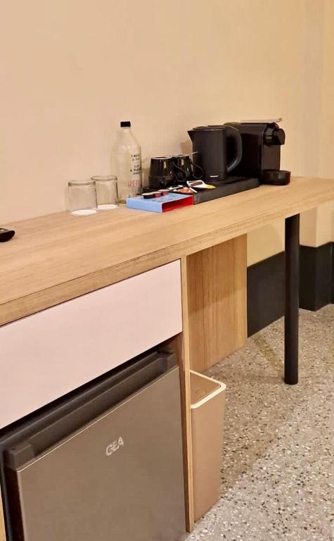 Kuchyň nebo kuchyňský kout v ubytování Liberta Hub Blok M Jakarta